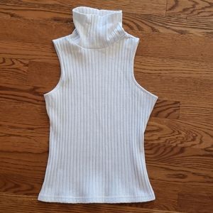 White faux sleeveless turtleneck